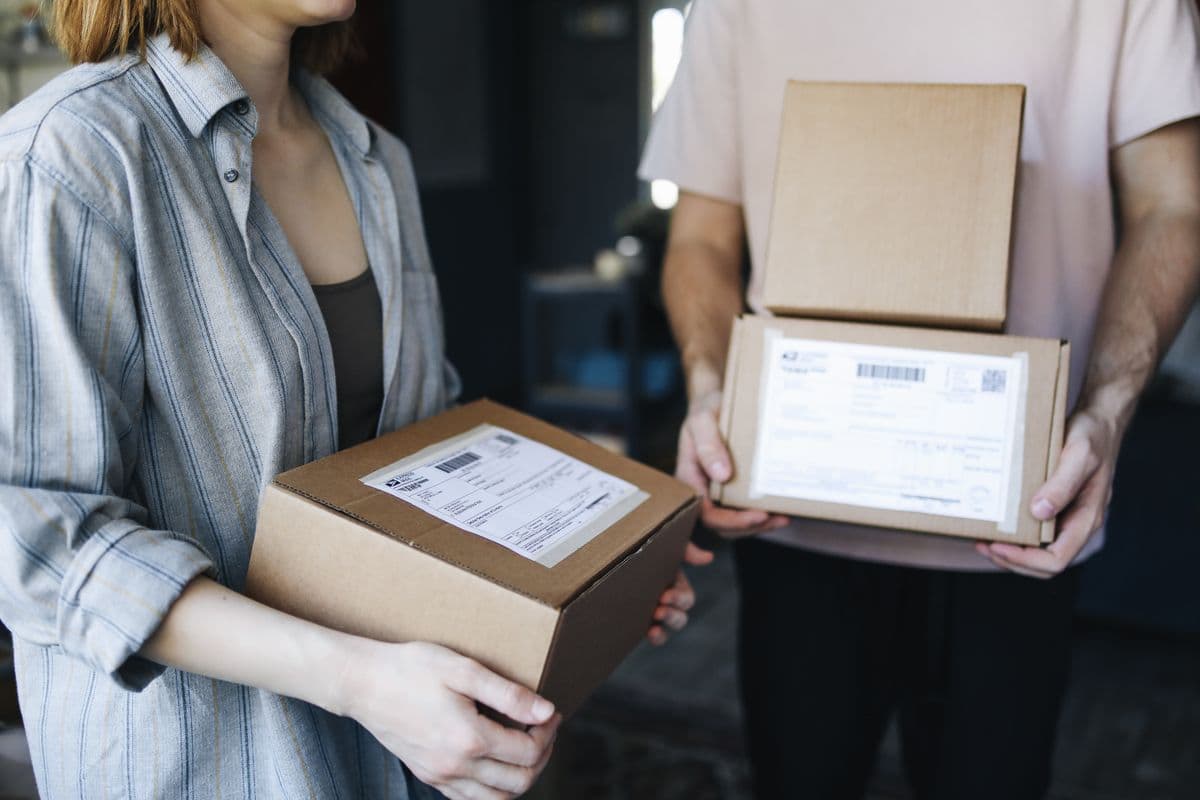 A parcel being handed over for delivery